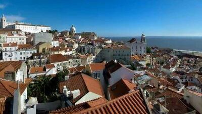 Lisbon's Alfama neighbourhood is a ramble of stepped cobbled alleys and terracotta roofs that shows what the city would have been like before a earthquakes levelled it in 1755. Getty Images