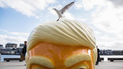 A giant head, depicting US President Donald Trump, created by artist Callum Morton is seen as part of the Sydney Contemporary Art Fair preview at Barangaroo. Paul Braven / EPA