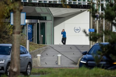 A person walks into the International Criminal Court in The Hague, Netherlands. EPA