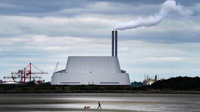 The Poolbeg incinerator at Sandymount strand, Dublin, burns waste to provide power to the national grid. PA