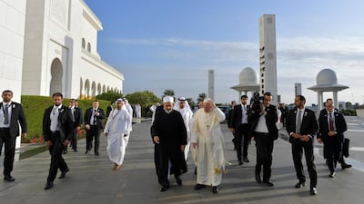 Pope Francis and Dr Ahmed Al Tayeb arrive for a meeting with the Muslim Council of Elders at the Sheikh Zayed Grand Mosque in Abu Dhabi. Reuters