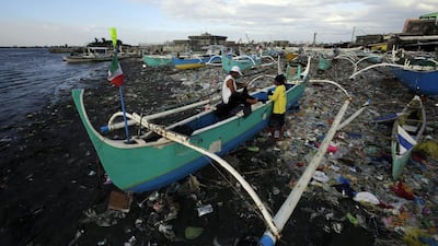 Fishermen in the Philippines repair their fishing equipment as the country braces for an upcoming typhoon in Navotas city, north of Manila, Philippines on December 4, 2014. Typhoon Hagupit, packing gusts of up to 230 kph, is edging closer to the east coast which bore the brunt of Typhoon Haiyan last year. Ritchie B Tongo/EPA