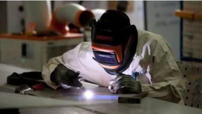 A Chinese manufacturing index signalled the first expansion in 13 months. Nelson Ching / Bloomberg