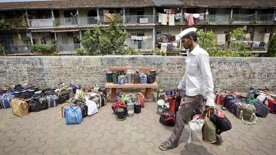 A reader wonders why the business model of dabbawalas has not been emulated by any other commercial organisation in India. Kuni Takahashi / AP Photo
