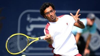 Omar Behrouzian in action against Sergiy Stakhovsky in the Dubai Duty Free Tennis Championship at the Aviation Club in Dubai.