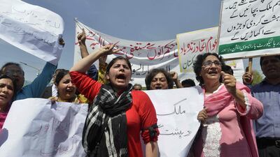 Lawyers join a protest against the suicide bomb attack by the Taliban which killed 73 people in Lahore. Arif Ali / AFP
