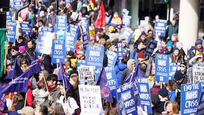 People gather in London ahead of a Support the Strikes march in solidarity with nurses, junior doctors and other NHS staff following recent industrial action. PA