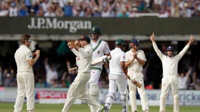 England captain Joe Root, second left, celebrates the final wicket to win the first Test with England's Liam Dawson, left, who took the wicket of South Africa's Morne Morkel, third left,at Lord's cricket ground in London, Sunday, July 9, 2017.