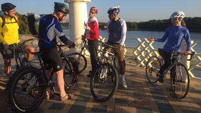 Canadian embassy staff get ready to cycle to work on the Eastern Corniche. Delores Johnson / The National