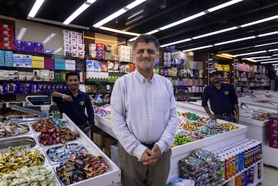 Morteza Asaadi, owner of Asaadi Super shop on the Dubai Creek in the Meena Bazaar area, hopes tensions ease soon. Antonie Robertson / The National