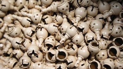 Heads of Playmobil figures are seen on the production line at the Playmobil Malta factory. Darrin Zammit / Reuters