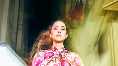 Blouse, Dh11,800; trousers Dh11,000; cape, Dh20,500; bag, Dh39,850, all Gucci