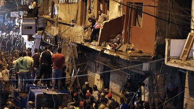 Lebanese soldiers and civilians gather near the site of an ISIS-claimed twin bombing in the area of Burj Al Barajneh in Beirut's southern suburbs on November 13, 2015. EPA