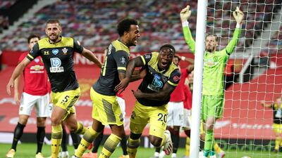 Southampton's Michael Obafemi, second right, celebrates after scoring his team's late winner against Manchester United at Old Trafford on Monday, July 13. AP