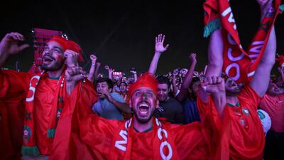 Thousands of Moroccans have made the trip to Doha. Here, they watch the Portugal game at a Fifa fan zone. AFP