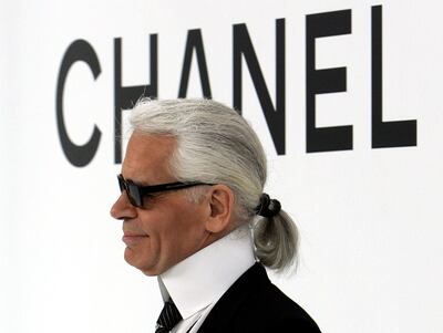 Karl Lagerfeld appears on the catwalk after his autumn/winter 2004/2005 runway show. Reuters