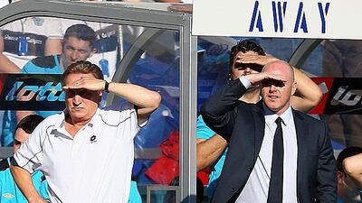 Neil Warnock, the QPR manager, and Steve Kean, the Blackburn manager, shield their eyes from the rare October sun at Loftus Road in London during their 1-1 draw.