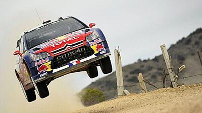 Sebastien Loeb's Citroen is airborne on his way to victory in the Rally Mexico.