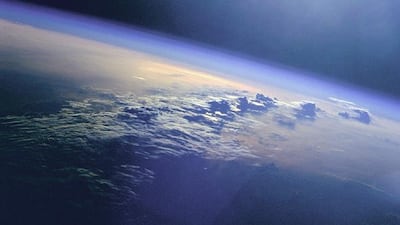 1999: Clouds and the sun seen during the STS-96 mission from the Space Shuttle Discovery.