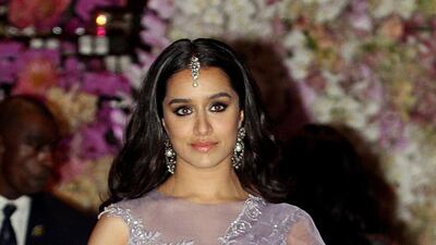 Shraddha Kapoor poses on arrival to Saturday's party. AFP