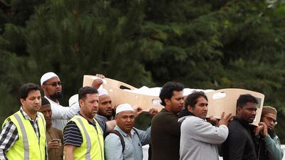 People attend the burial ceremony of Hussein Mohamed Khalil Moustafa, 70, at the Memorial Park Cemetery in Christchurch. Reuters