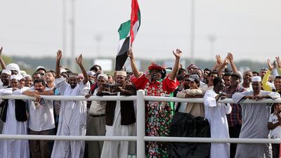Fans watching the opening race on Friday during the first official meeting at Al Ain Racecourse. Satish Kumar / The National