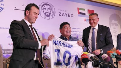 From left: Dr Taj Eddin Seif, chairman of Belarusian Business Council in the UAE and Dynamo Brest co-owner, Diego Maradona, the club's new chairman, and Valdas Ivanauskas, vice chairman during the press conference held at Emirates Palace hotel in Abu Dhabi. Pawan Singh / The National