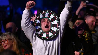 Darts fans enjoy the atmosphere during the 2024 BetMGM Premier League Darts at Utilita Arena in Newcastle upon Tyne, England. Getty Images