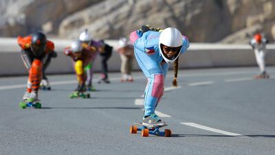 Rhiz Vosotros, foreground, and fellow members of the Dubai Longboarding Community on the roads of Jebel Jais in Ras Al Khaimah. Basic equipment costs about Dh1,000 to get started. Victor Besa for The National