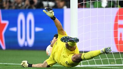 Sevilla's Bono in action during the penalty shoot-out. Reuters