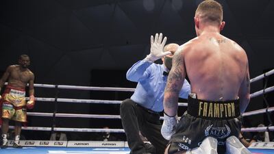 Carl Frampton of Northern Ireland knock off balance by Jamel Herrinng of United States against Jamel Herring of USA at the Rotunda, Ceasar's Palace, Bluewaters Island, Dubai. Leslie Pableo for The National