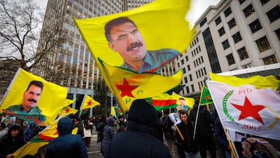 Supporters of Abdullah Ocalan wave flags during a protest in Belgium. The PKK leader called on militants to lay down arms last year. EPA