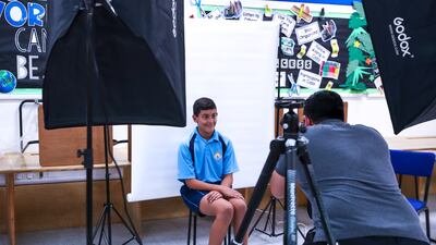 Say cheese! Masks are not required for official photographs.