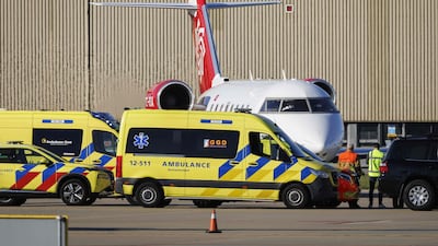 A second plane believed to be carrying a sick passenger arrives at Schiphol airport. AFP