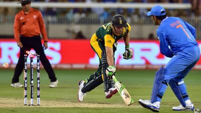 The run out of AB de Villiers sparked a collapse and allowed India a first win over South Africa at the World Cup. Saeed Khan / AFP