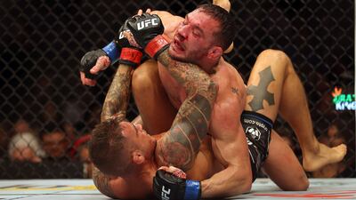 Dustin Poirier battles Michael Chandler during their lightweight fight at UFC 281. Getty