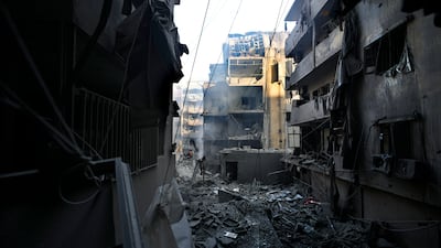 The Israeli air strikes destroyed and eight-storey building and damaged others in central Beirut's Basta district. AP