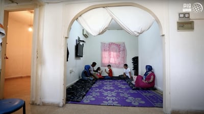 Sama and her family in their home in Beirut. Their flat was damaged by the port blast in August. Wam