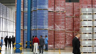 Coca-Cola, PepsiCo and Aujan Group are among Can-Pack's clients. Above, different type of cans stored at the company's new facility at Dubai Investment Park. Pawan Singh / The National