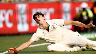 Australia fielder Pat Cummins fails to prevent a boundary. Getty