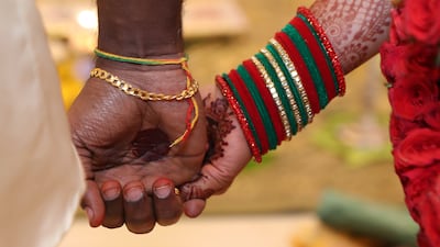 The bride and groom walk around a symbolic sacred fire seven times to signify they are completing their marriage vows