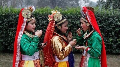 Indian folk dancers drink tea before a full dress rehearsal for the Republic Day parade in Kolkata. Rupak De Chowdhuri / Reuters