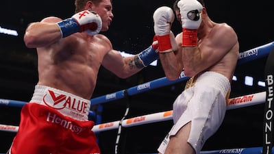 DCanelo Alvarez (red) and Callum Smith during their WBA, WBC and Ring Magazine super middleweight championship bout at the Alamodome in San Antonio. USA Today