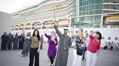A spot of traditional dancing practice for passengers on the cruise liner Brilliance of the Seas in Abu Dhabi yesterday.