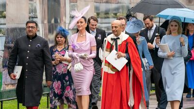 Singer, centre left, Katy Perry leaves Westminster Abbey following the coronation of King Charles III and Queen Camilla. PA