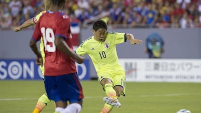 Shinji Kagawa of Japan takes a shot on goal during their friendly match against Costa Rica on Monday. Andrew Patron / AFP / June 2, 2014