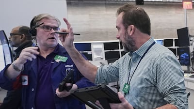 Traders at the New York Stock Exchange. Investors are anxious over whether the Fed will cut rates again following the longest US government shutdown. AP