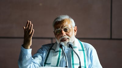 Indian Prime Minister Narendra Modi addresses party supporters during a celebration event ahead of wining the Karnataka election in New Delhi on May 15, 2018. Chandan Khanna / AFP