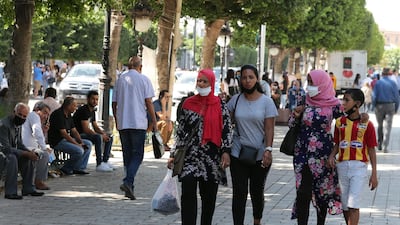 Tunisian wear masks as a precaution against Covid-19 as they go out in Tunis, Tunisia on 09 October 2020. A countrywide curfew is going into effect on Tuesday to curb the spread of the virus. EPA