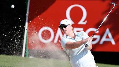 Lydia Hall playing a shot from a bunker at the Omega Dubai Ladies Masters at Emirates Golf Club in Dubai.